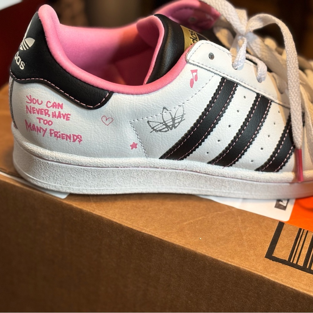 Adidas Kids' White and Black Sneakers with Pink Accents